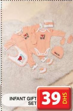 Infant gift set including a onesie, bib, cap, mittens, and booties.